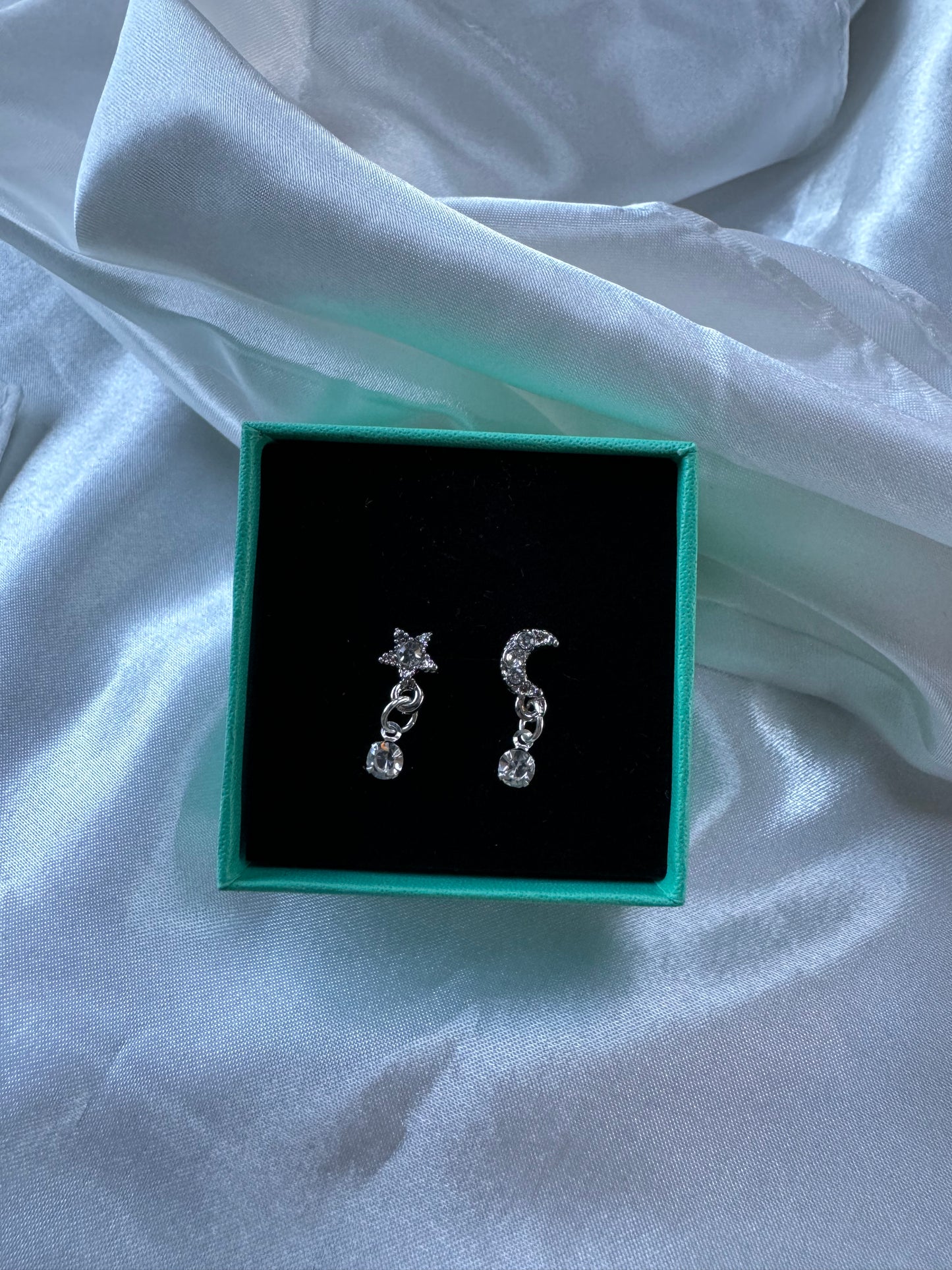 The moon and her star earrings